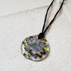 Glass pendant necklace on leather cord